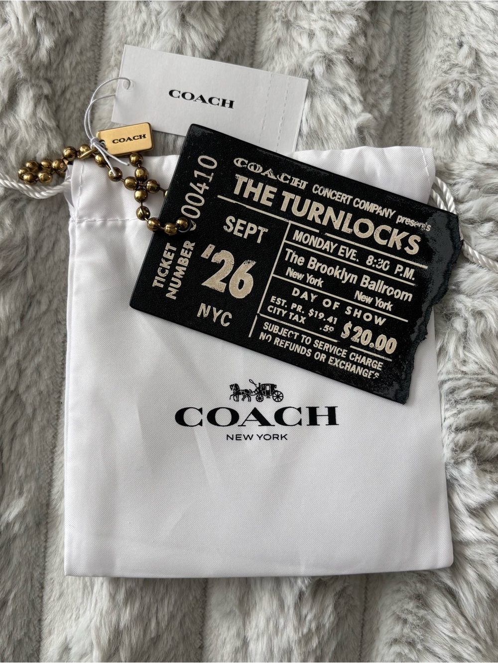 COACH The Turnlocks Concert Bag Charm